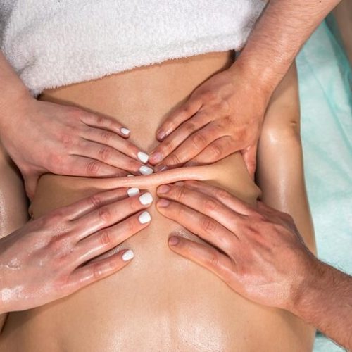 relaxing-tantric-massage-client-s-person-four-hands-using-aroma-oils_359031-33175